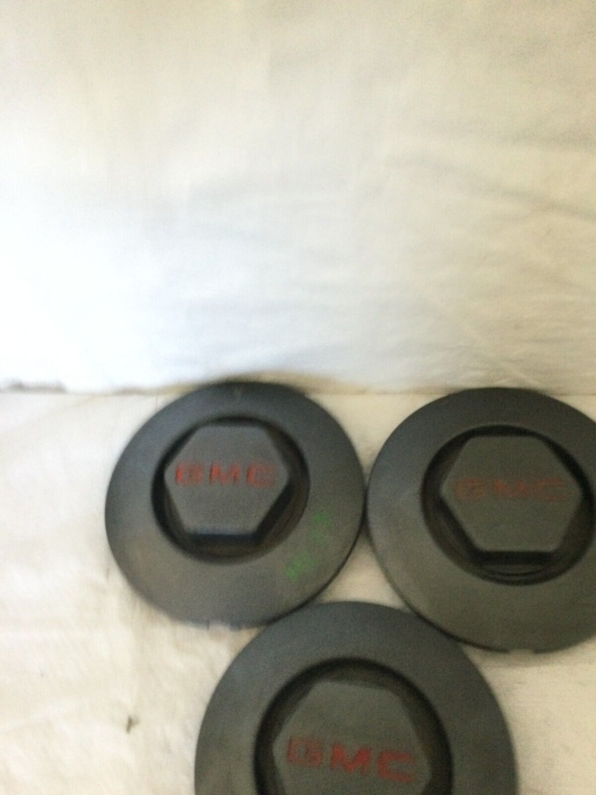 GMC 15998644 wheel center caps Jimmy Sonoma S15 OEM