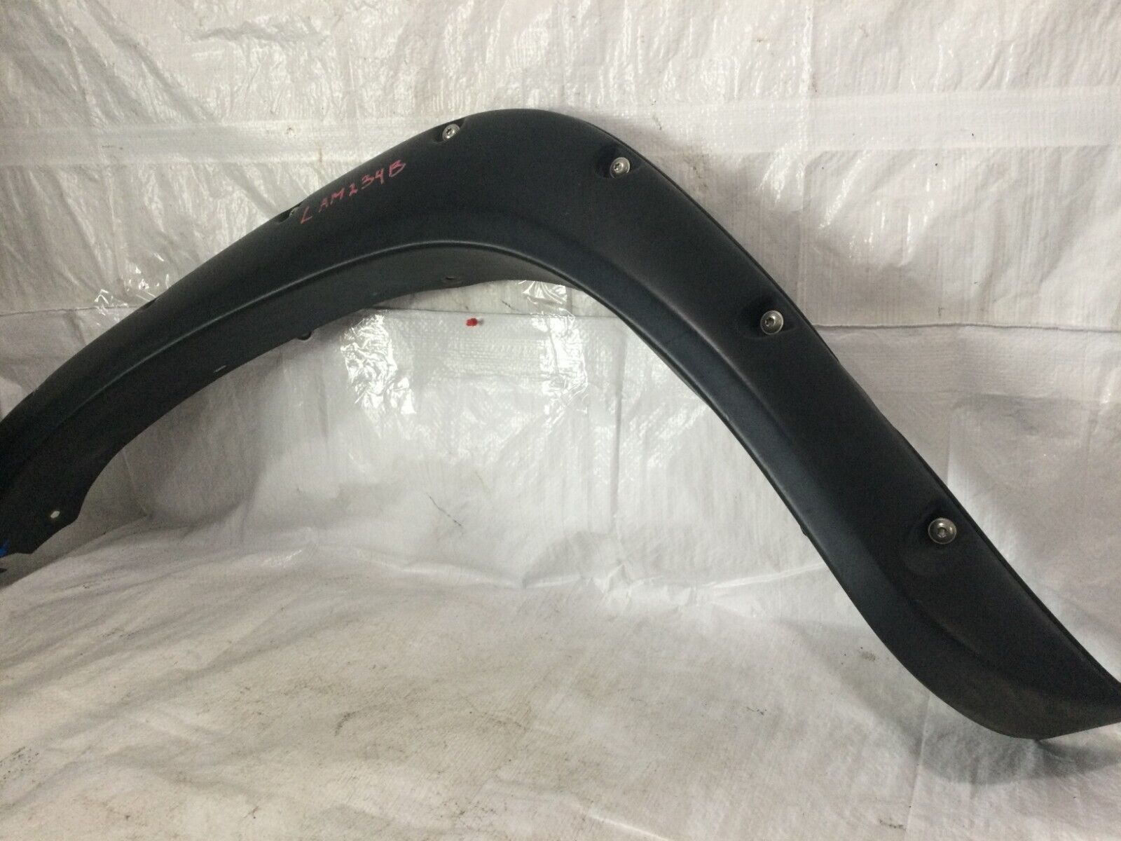 2006 Dodge Ram 1500 Front Left Fender Flare OEM ( DAMAGE MARKED )