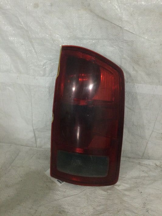 2003 Dodge Ram 2500 Passenger Side Tail Light OEM 55077116 MARKED DAMAGE