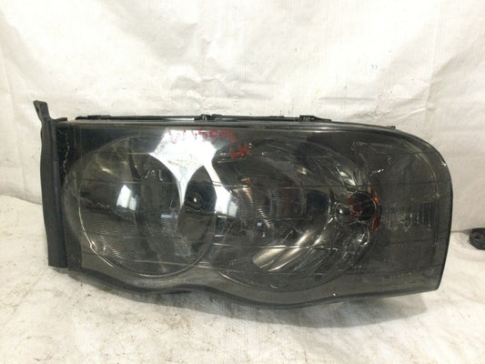 2004 Dodge Ram 1500 Black Headlight Left Driver Side OEM ( DAMAGE TAB )