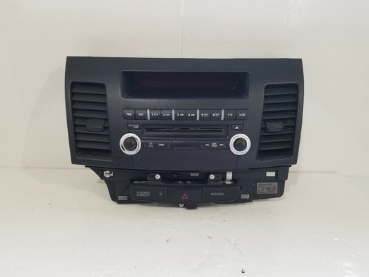 2012 Mitsubishi Lancer Stereo Radio Face Plate Hazard Switch Panel 8002B572XA OE