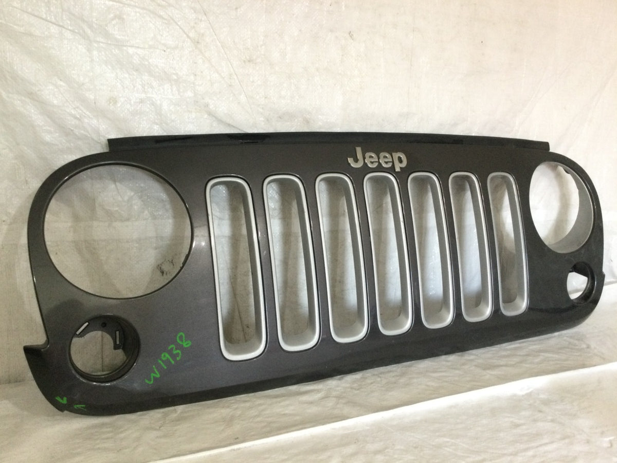 2007-2018 Jeep Wrangler JK Grille OEM 5NB84TRM MARKED DAMAGE LOOK PHOTO
