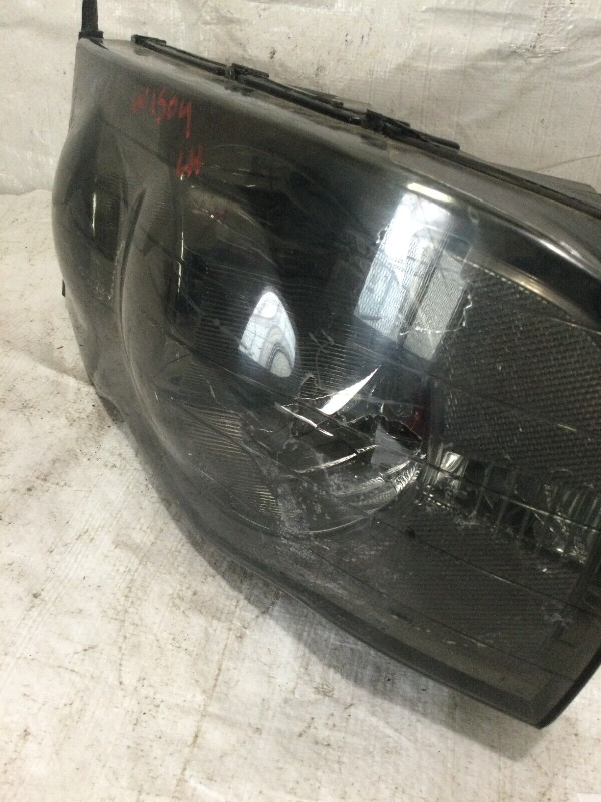 2004 Dodge Ram 1500 Black Headlight Left Driver Side OEM ( DAMAGE TAB )