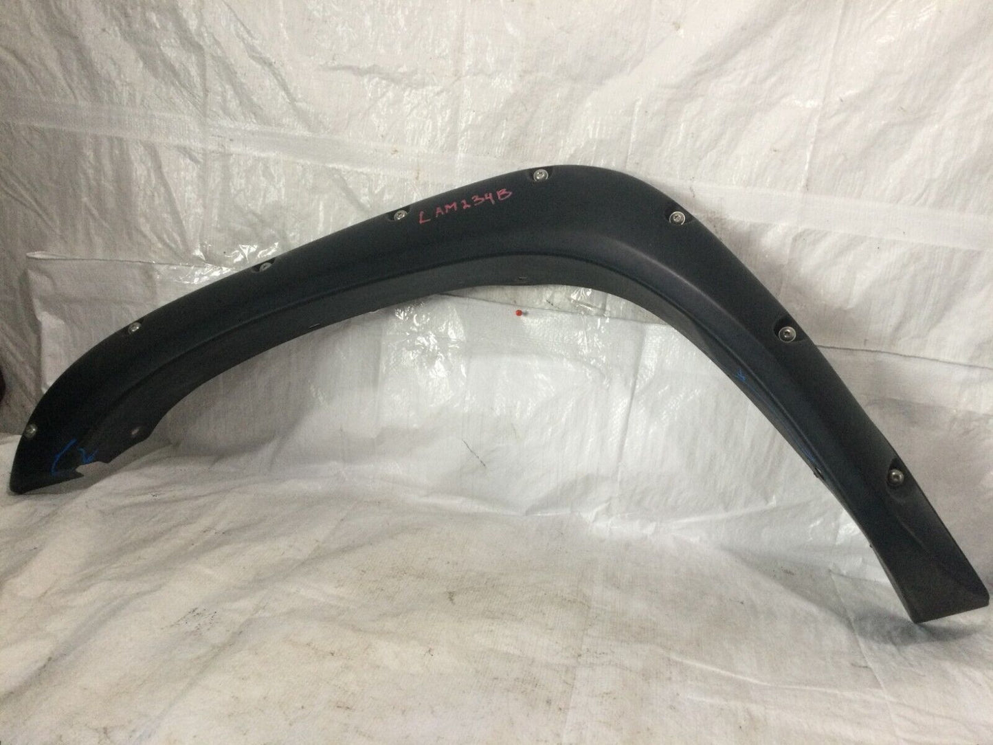 2006 Dodge Ram 1500 Front Left Fender Flare OEM ( DAMAGE MARKED )